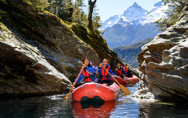 Funyak group paddling inflatable kayaks in the Rockburn Chasm