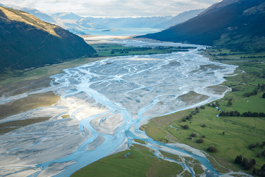 Aerial view of the impressive braided Dart River Valley in Mount Aspiring National Park, surrounded by towering mountains