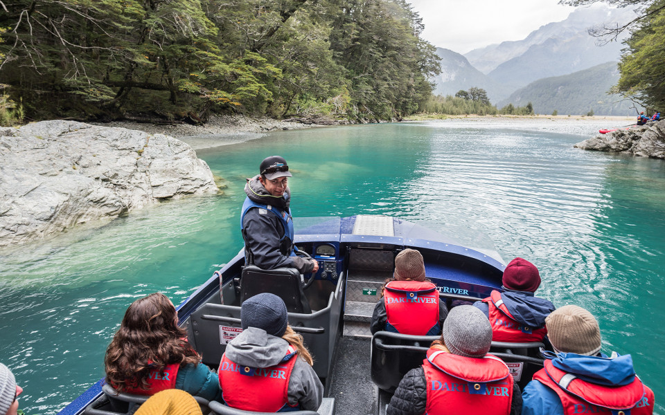 Visitors enjoying Wilderness Jet boat adventure on the Dart River in Mount Aspiring National Park